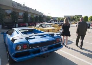 Gala attendees pass a row of exotic sports cars on their way into Sunday's fundraiser for Caterina's Club, serving Southern California's "motel kids," at the Marconi Automotive Museum in Tustin.
///ADDITIONAL INFO: tu.0901.lamborghini- 08/28/16 - PHOTO BY JEFF ANTENORE, CONTRIBUTING PHOTOGRAPHER Ð
