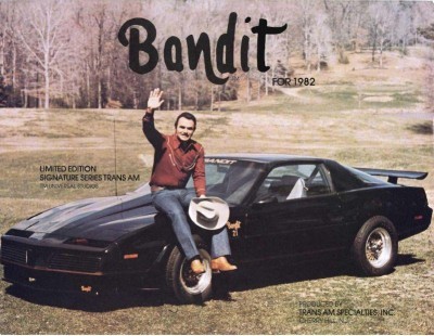Burt Reynolds ontop of a Trans Am in the movie Bandit. [ 78ta.com]